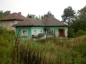 Old rural house with plot of land located next to big river