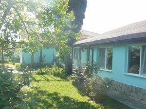 Two one-storey houses in a yard 4 km from the sea