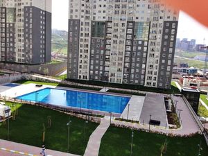 Furnished 1+1 compound apartment pool view for sale Istanbul
