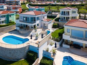 Villa first row from the sea for sale in a golf resort