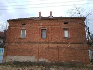 Old rural house with garage, barn and land in a big village