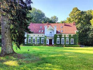 The hunting palace in a small village surrounded by a forest