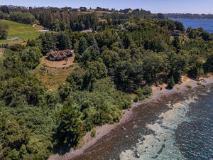 Large property with residential house and private beach 