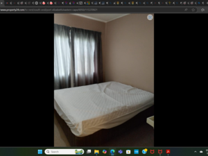 A SECTIONAL TITLE UNIT LOCATED A WALKING MILE FROM THE BEACH