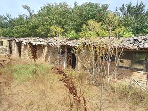 An old house with a plot of land of 3215 sq.m