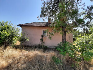 Old rural house with yard and views in a village near river