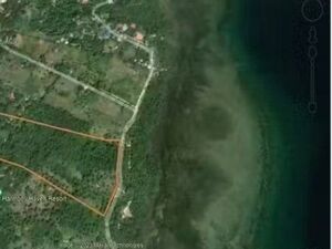 Titled Lot Overlooking Sea 