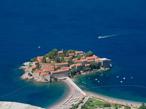 A plot with a view is for sale under Sveti Stefan