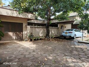 Prime Road-Front Property with House for Sale