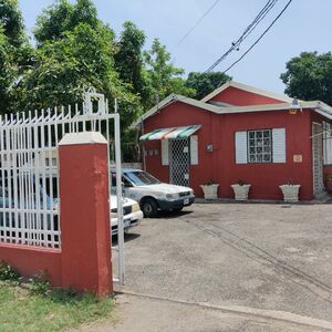 Multi-Function Building & Land in Kingston (Cash Sale Only!)