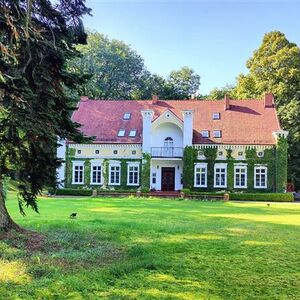 The hunting palace in a small village surrounded by a forest