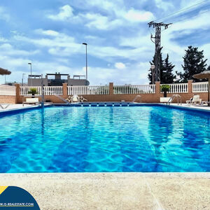 Second-floor bungalow with communal swimming pool