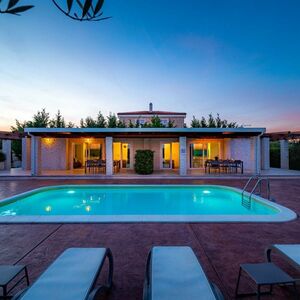 Single-Storey Villa with Two Units and a Shared Garden