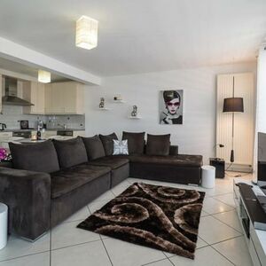    The apartment offers two bedrooms and a bathroom, 