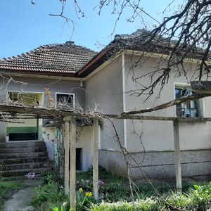 Big rural property with two houses, land and river view