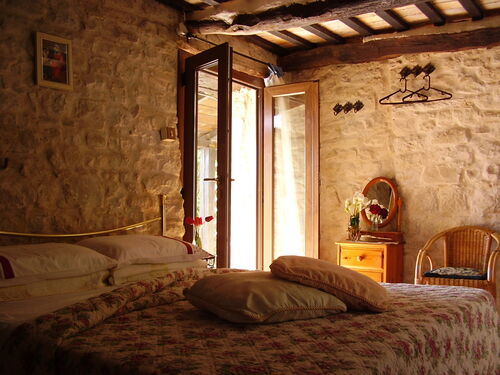 Bedroom with woodburner
